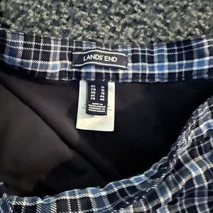 Lands in uniform skort (4) in total.